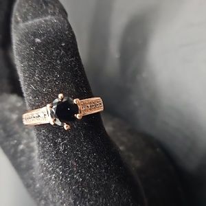 I-5 Rosegold tone ring with black solitaire